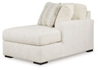 Ivory corner chaise sectional with fitted cushions and ribbed textured pillows