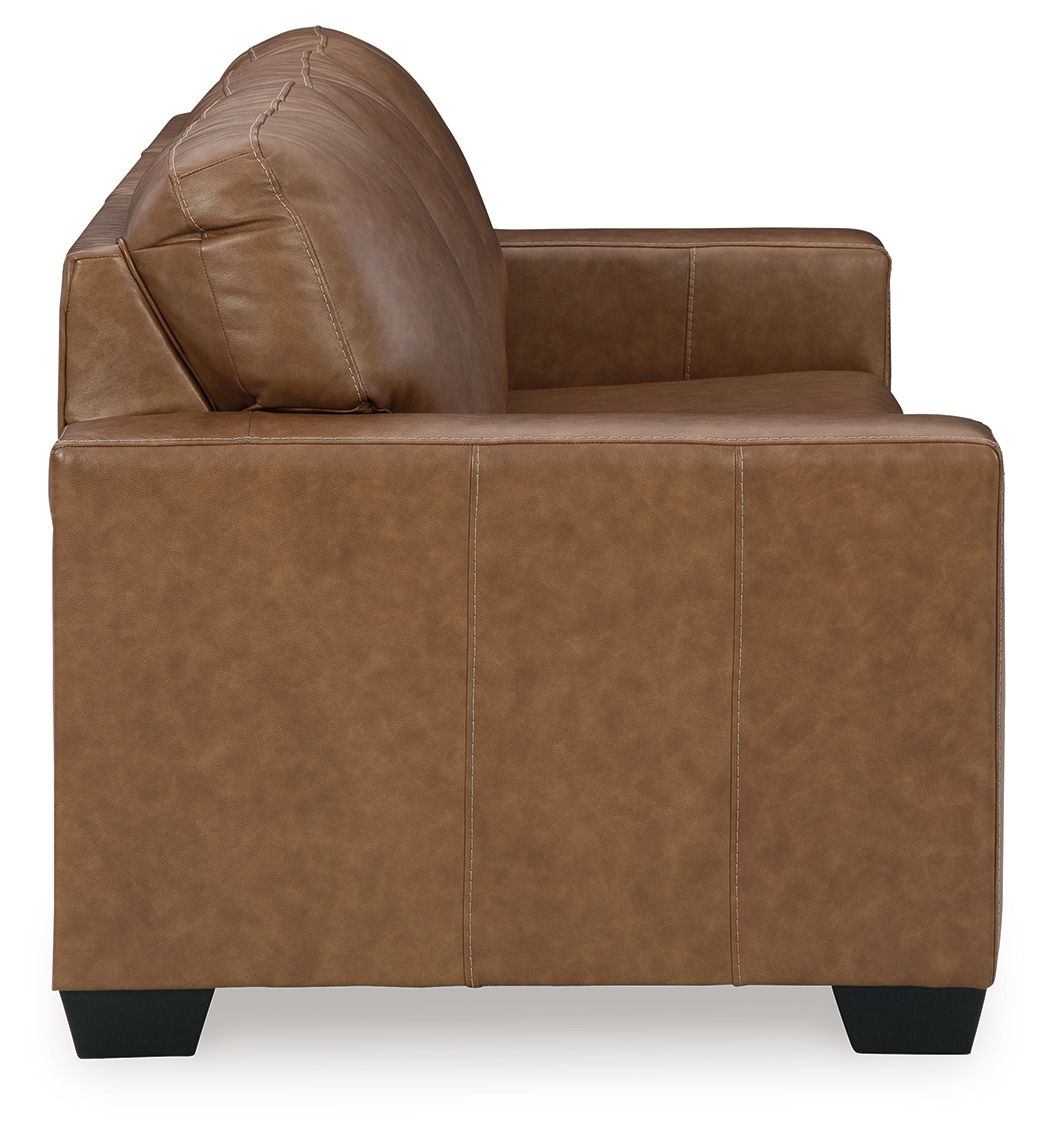 Light brown leather loveseat with a rounded back and padded armrests