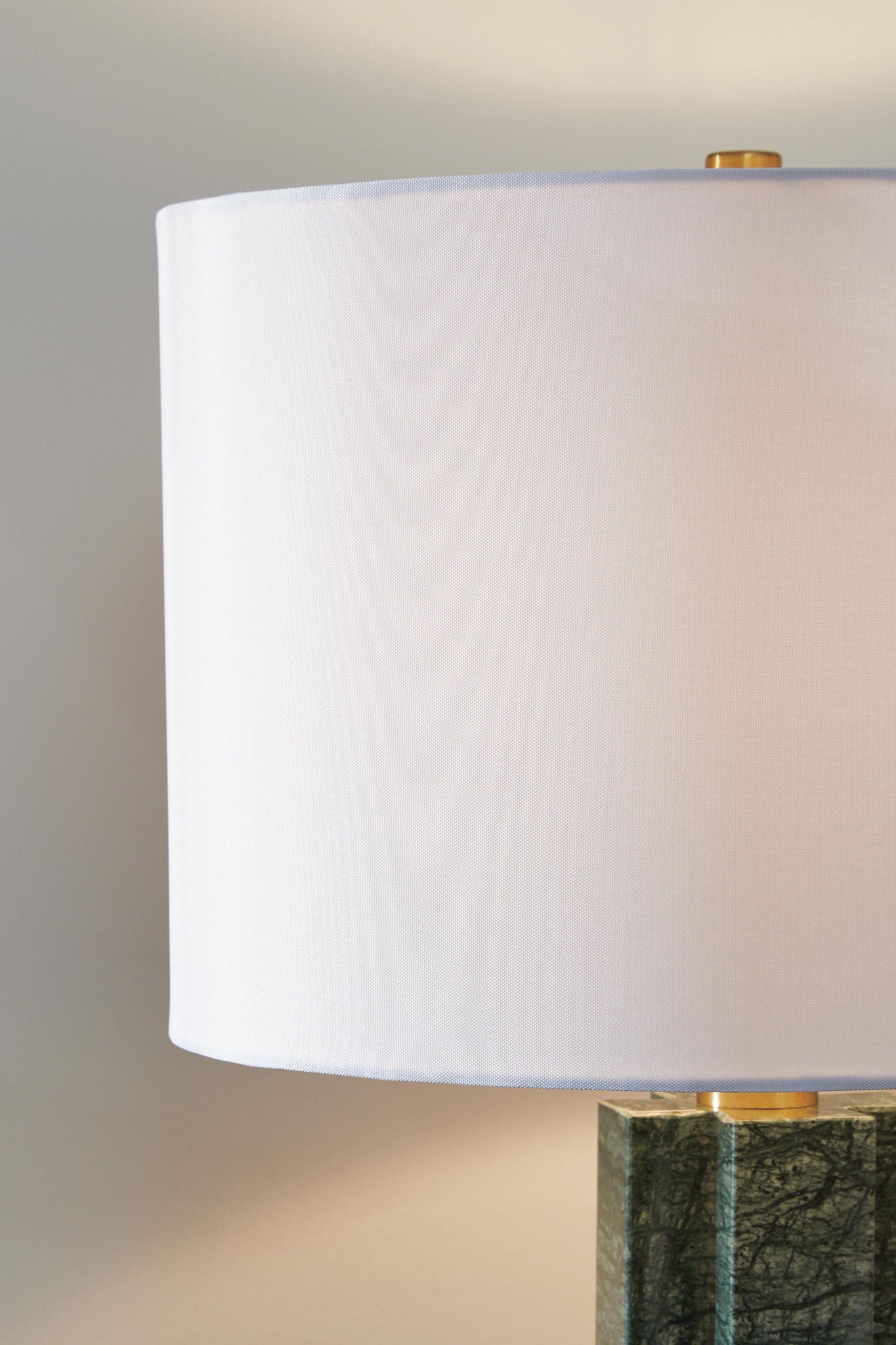 Green marble table lamp with white shade top and brass socket