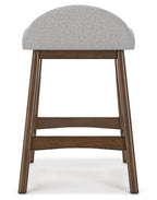 Upholstered barstool with rounded gray seat and back, dark wood legs