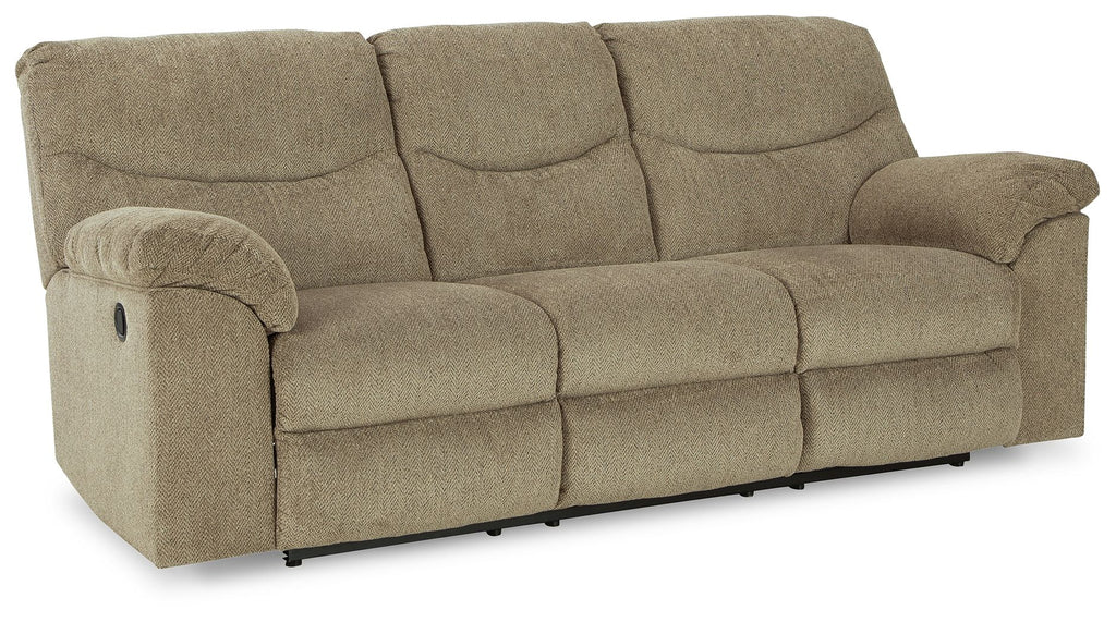 Reclining sofa with beige textured fabric, three seat cushions, and rolled armrests.
