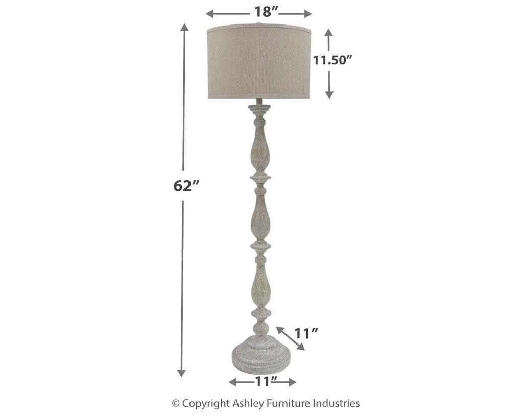 Whitewash poly floor lamp with beige drum shade and turned pedestal stem