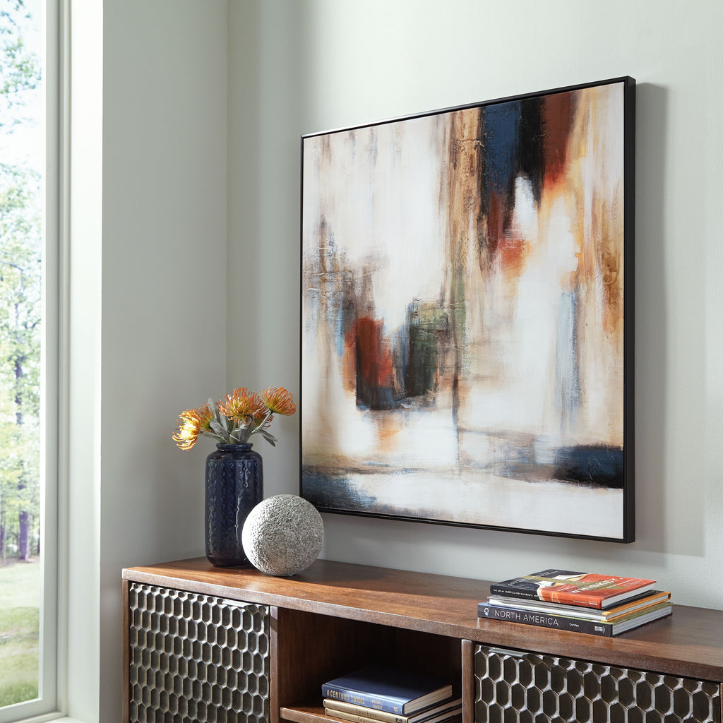Framed abstract wall art with white, teal, and gold vertical brushwork.