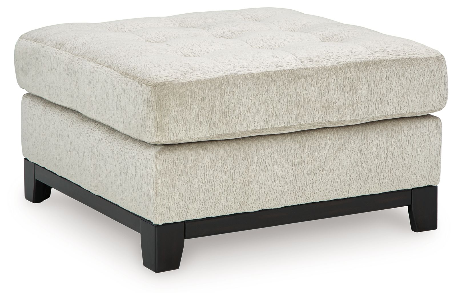 Beige oversized accent ottoman with tufted top and dark wooden legs