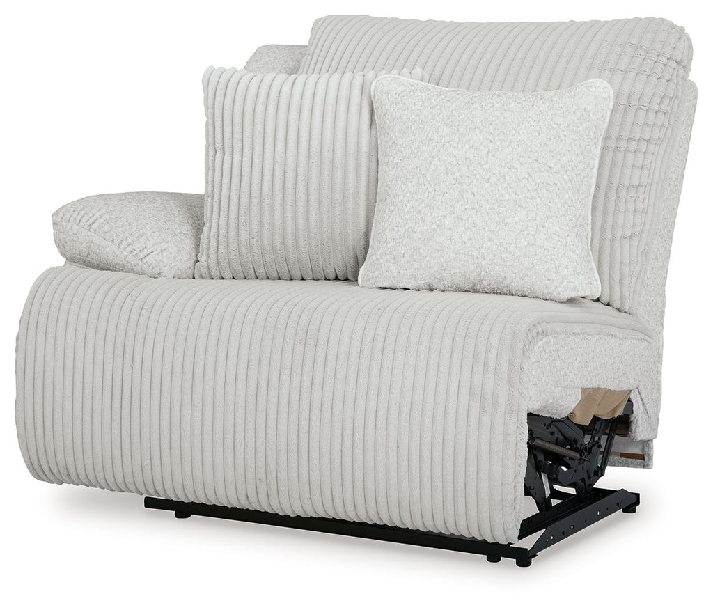 Light gray ribbed wall recliner with two cushions and visible recline mechanism