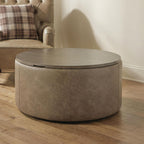 Round warm brown storage ottoman with smooth vinyl-look upholstery, closed lid