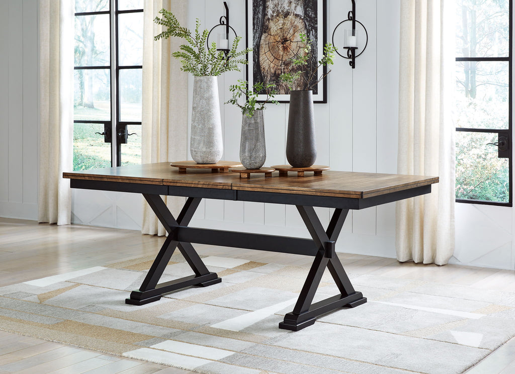 Dark brown dining table with black X-base and square tabletop