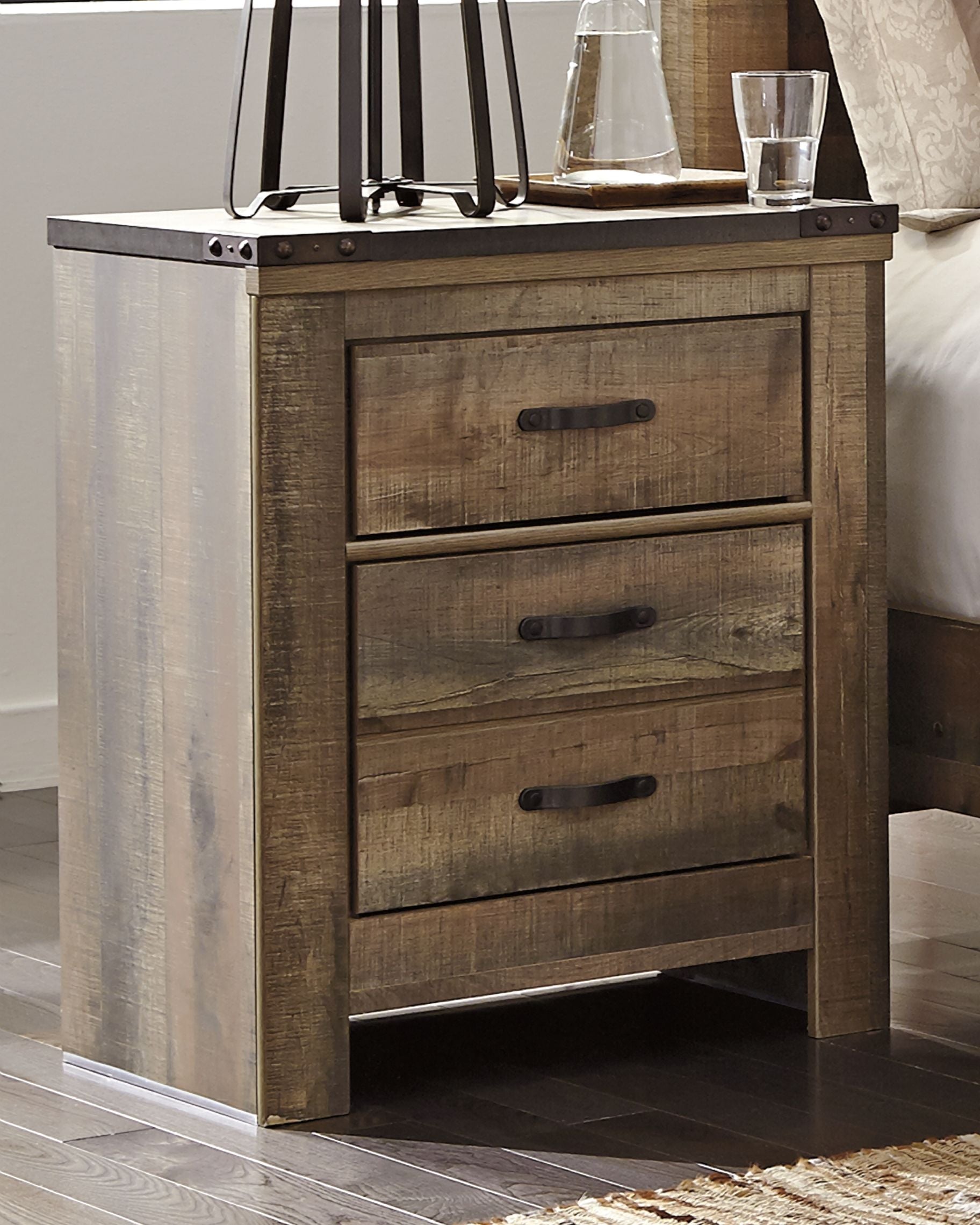 Dark brown night stand with three drawers and top open shelf