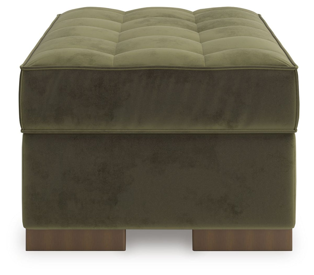 Olive upholstered ottoman with quilted lid and block feet