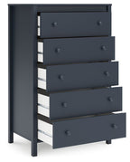 Navy blue five-drawer chest with multiple drawers pulled out, round knobs