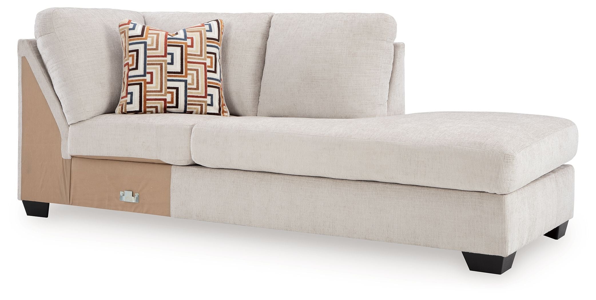 Stone fabric corner chaise with geometric throw pillow and black legs