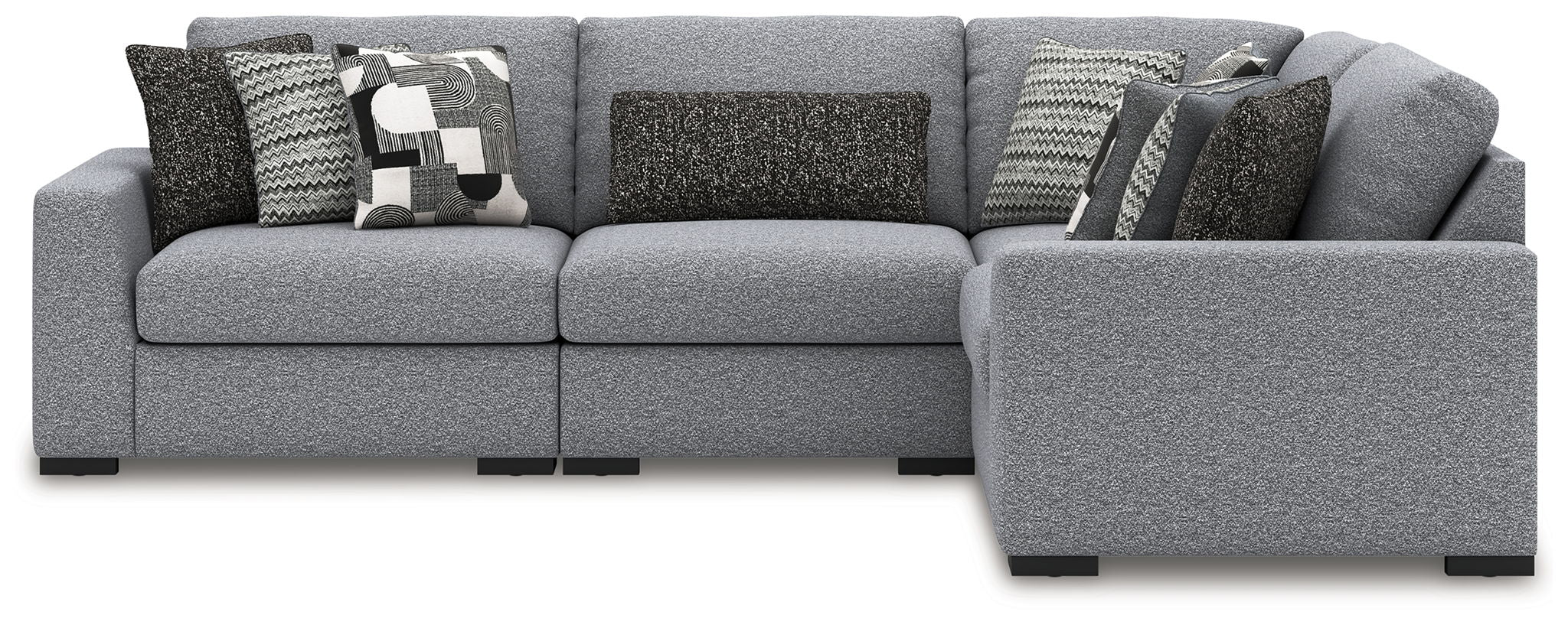 Gray sectional sofa with corner chaise and patterned throw pillows