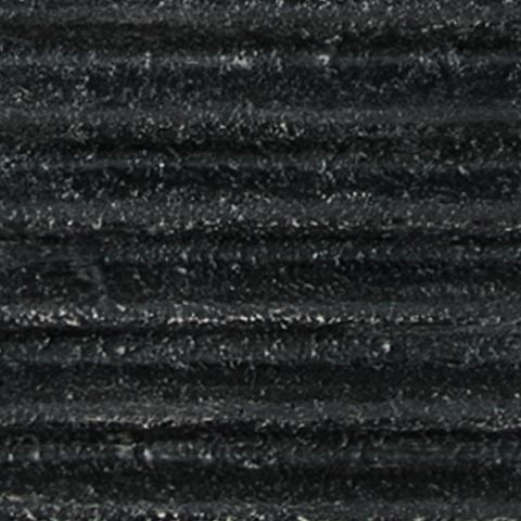 Ribbed black lamp base texture close-up