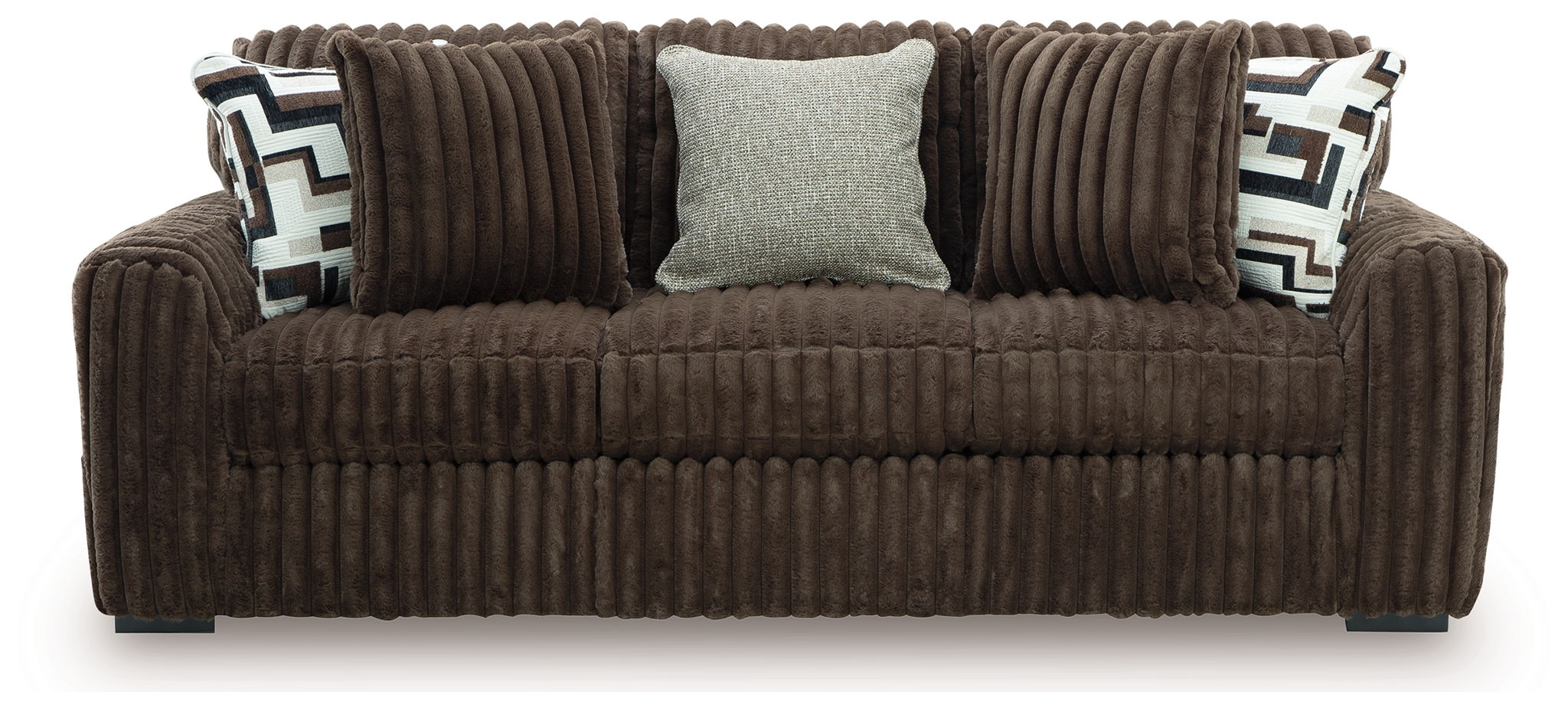 Dark brown corduroy sofa front view with two patterned pillows and three back cushions, light accent pillow