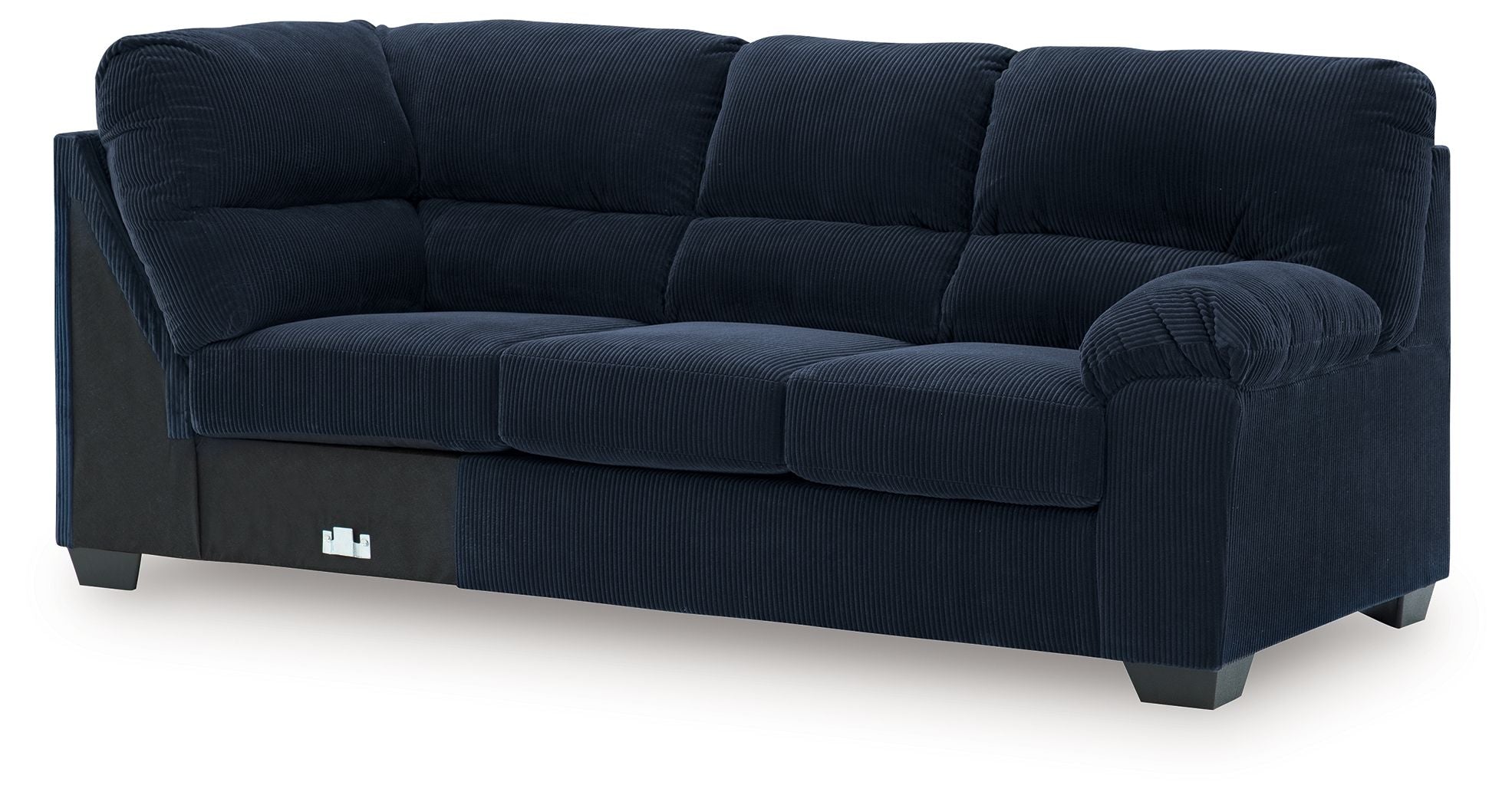 Navy upholstered sofa with corner wedge, tufted back, rounded arm and three seat cushions