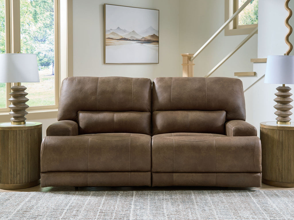 Earth-tone 2-seat power reclining sofa with adjustable headrests, plush seat and back