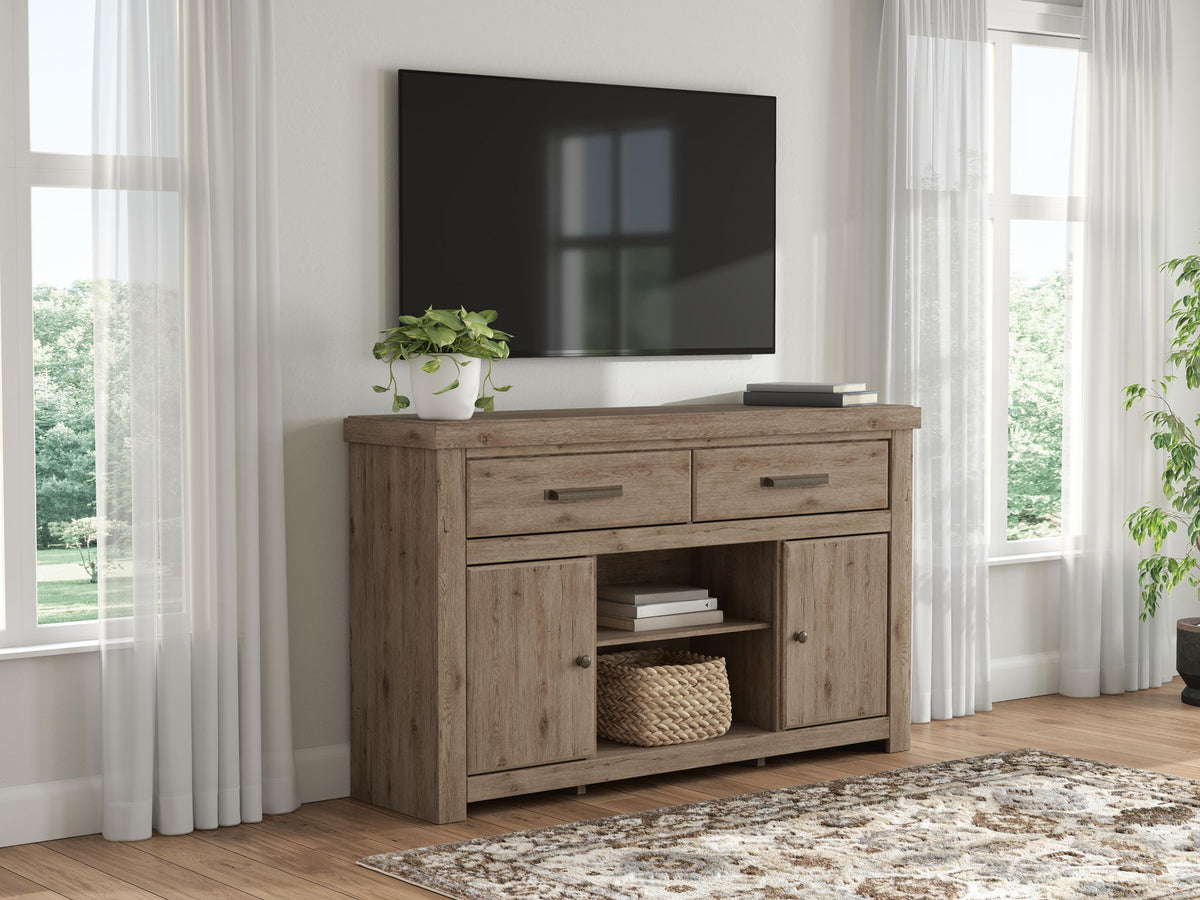 Light brown wood TV stand with drawers and cabinet doors, styled in a living room.