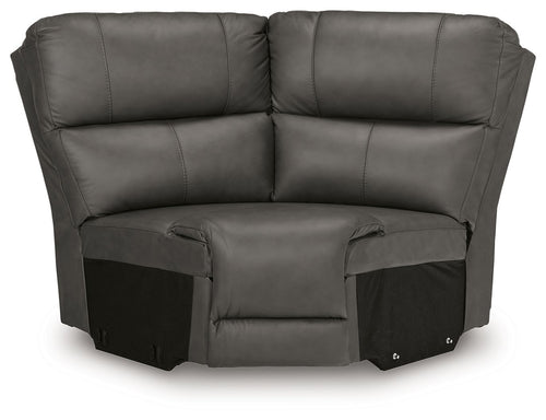 Upholstered wedge seat in dark gray with padded arms, backrest, and attached footrest