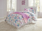 White sleigh bed headboard with tall curved frame and floral bedding