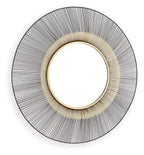 Round accent mirror with black radial metal lines and gold inner frame