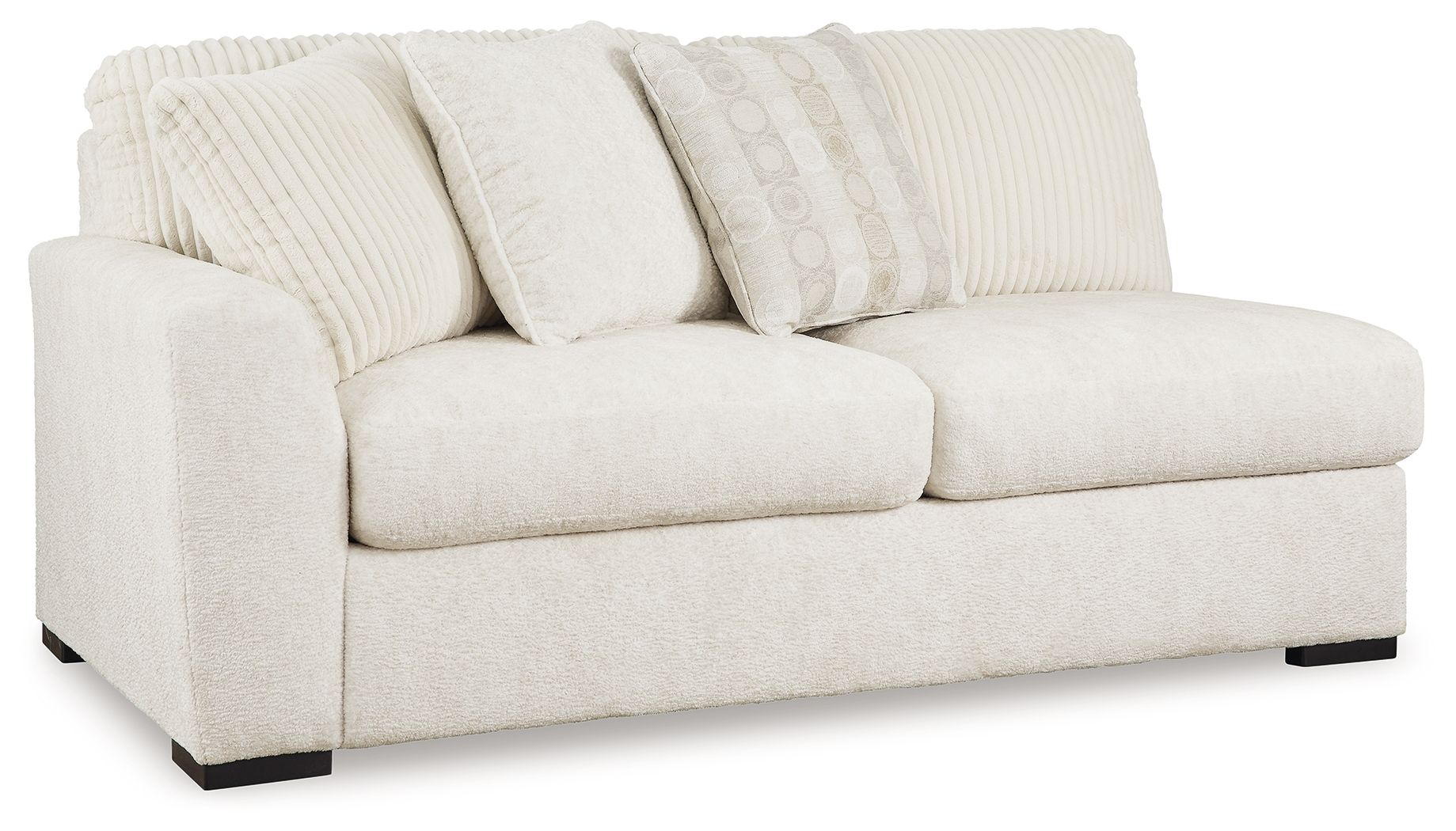 Light ivory fabric sofa with two seat cushions, arched arms, and back pillows