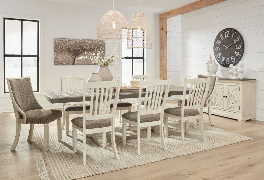 Dining room set with rectangular table, white chairs, and matching sideboard
