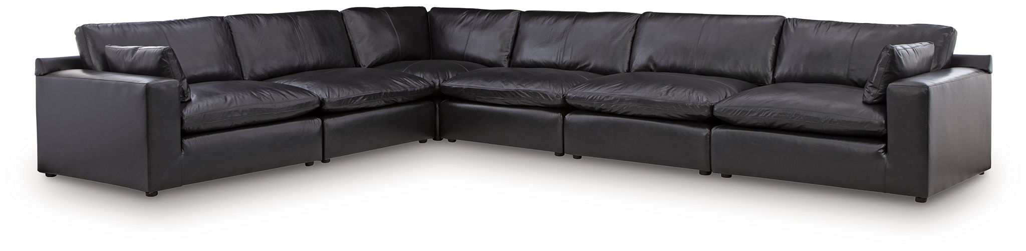 Black leather-look sectional sofa with multiple connected chaise sections and back pillows