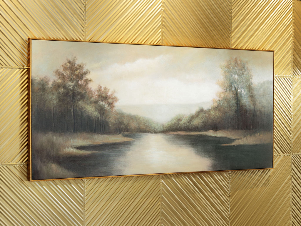 Framed wide river landscape painting with autumn-toned trees and cloudy light sky