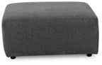 Oversized accent ottoman in dark gray textured fabric with rounded corners