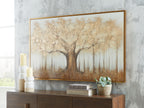 Framed wall art featuring a tree silhouette with white hanging forms on warm background