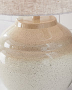 Speckled cream lamp base with neck socket and fabric drum shade top