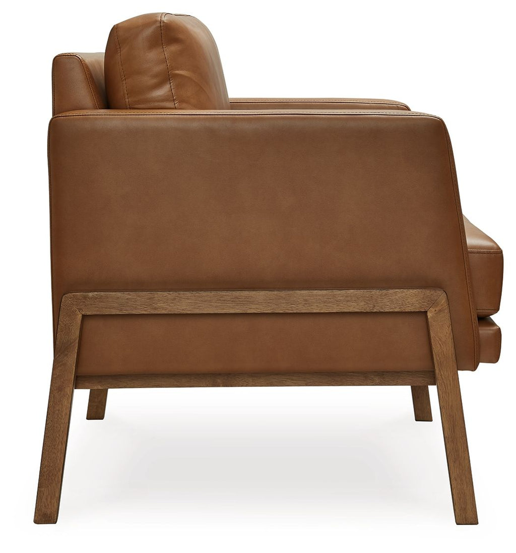 Caramel accent chair back view with stitched back panel and wooden frame legs