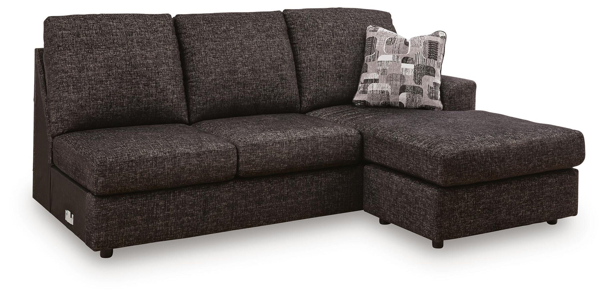 Dark charcoal sofa chaise with tufted cushions and two accent pillows