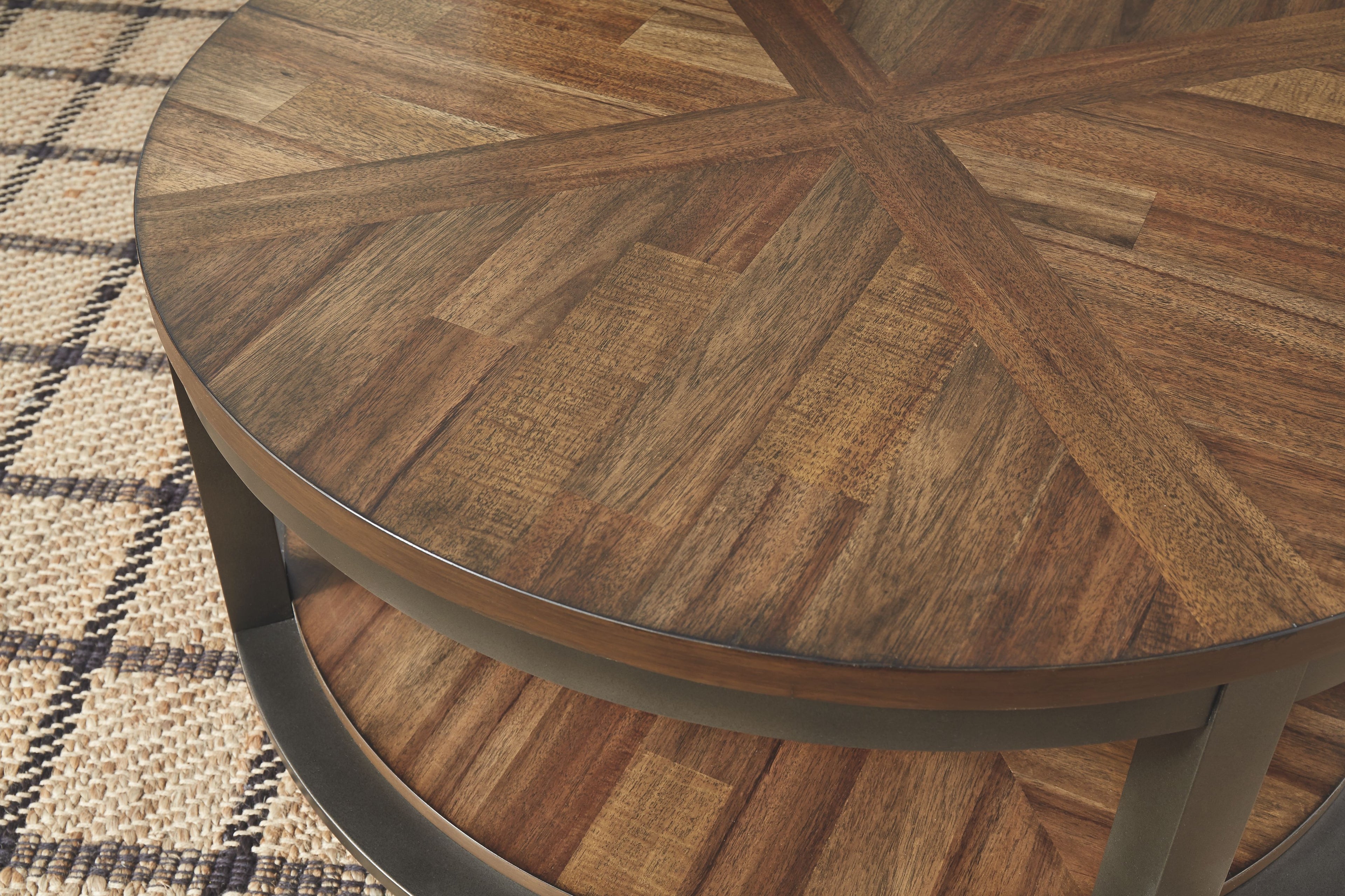 Round wood occasional table with patterned light brown top and dark frame