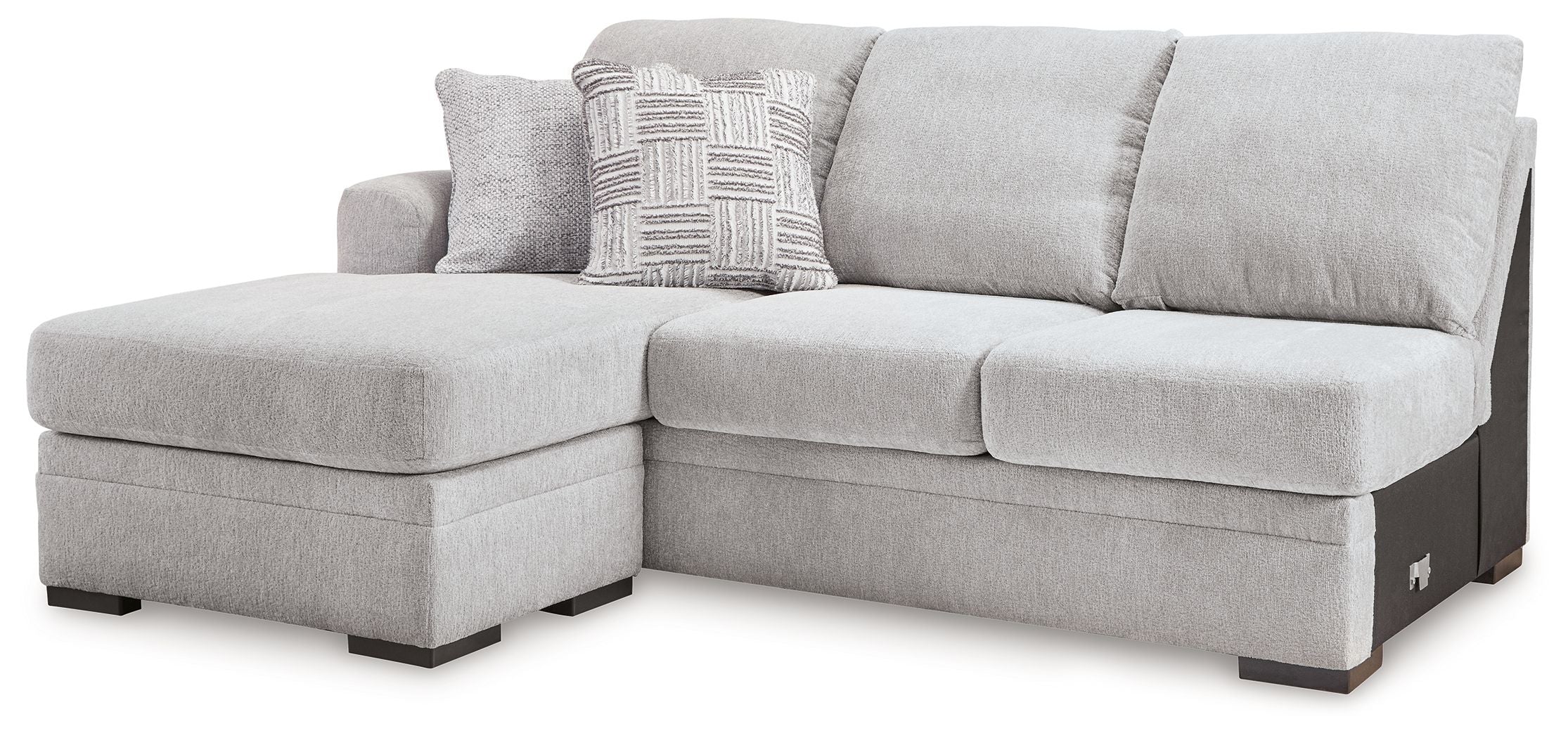Light gray fabric sofa chaise with left chaise extension and two throw pillows