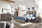 Panel bookcase bed with under-drawer storage, dark wood frame, blue bedding, open back shelf