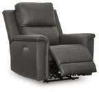 Power recliner in dark gray with adjustable headrest, footrest extended, side view