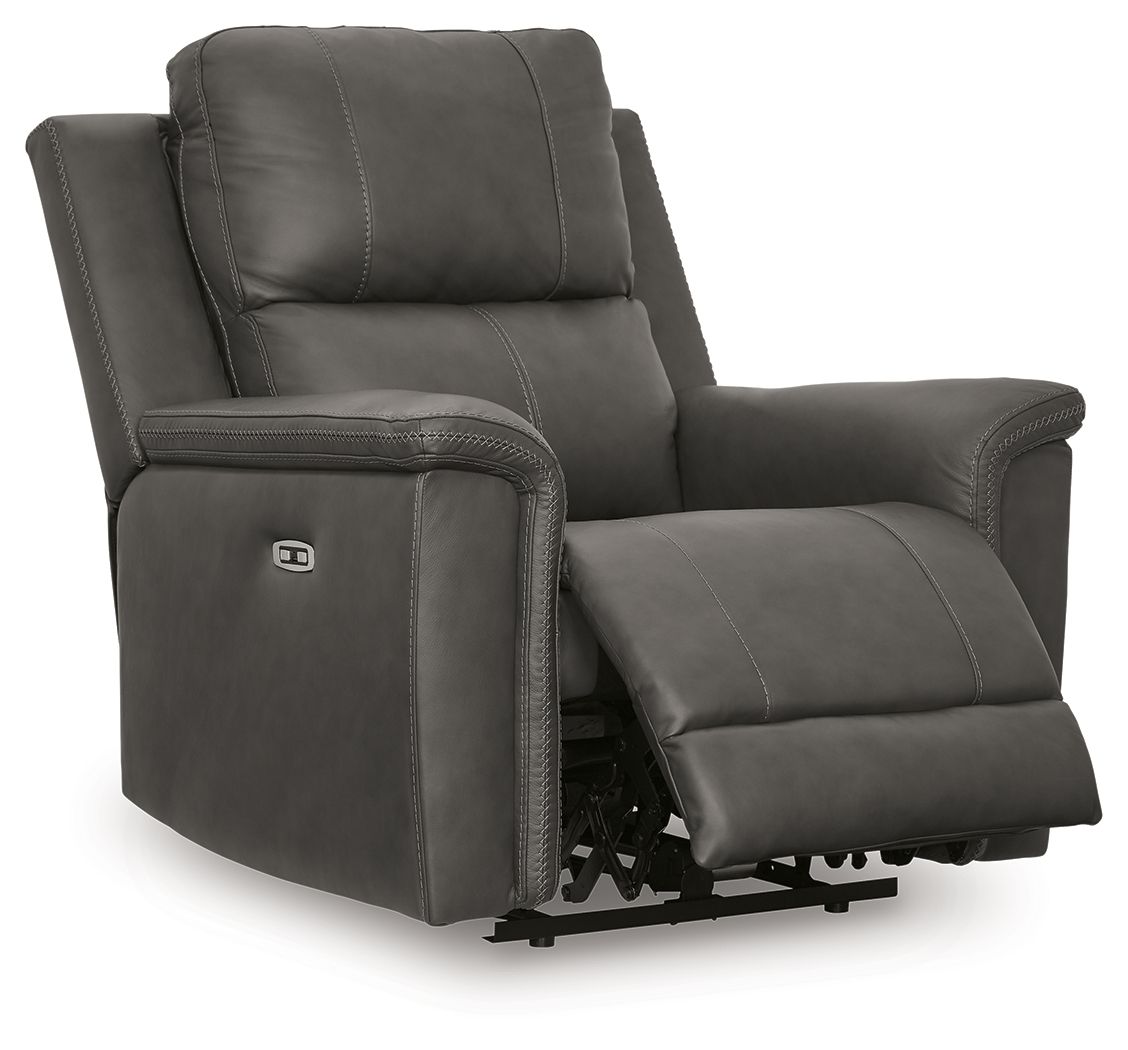 Power recliner in dark gray with adjustable headrest, footrest extended, side view