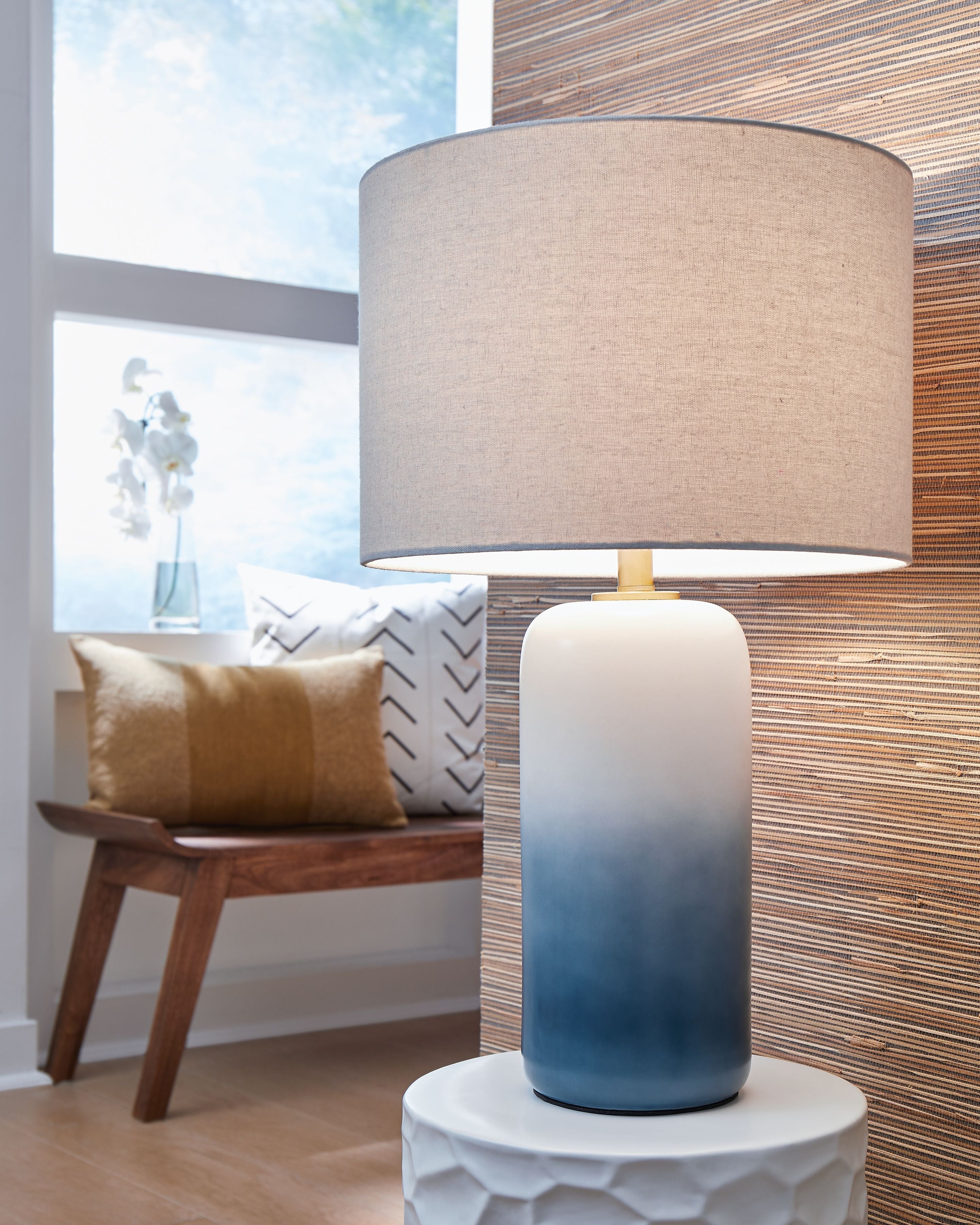 Ceramic table lamp with blue gradient ceramic base and beige drum fabric shade