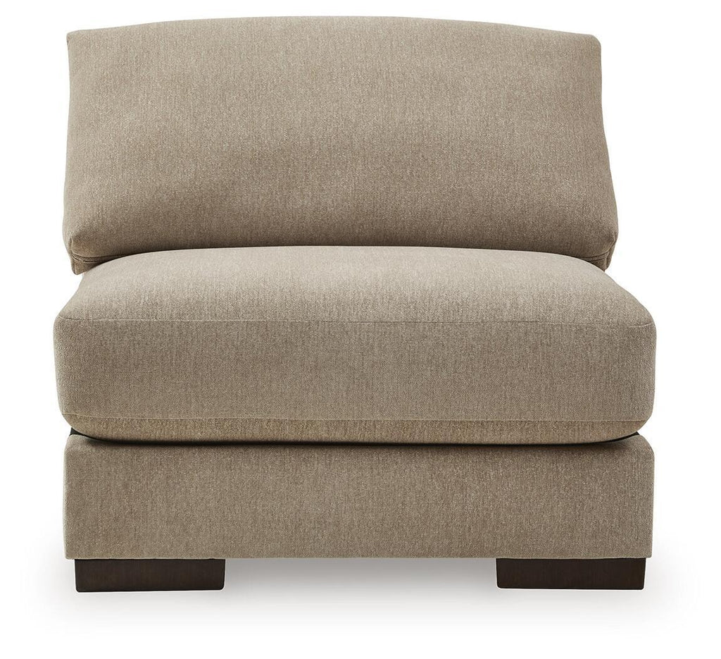 Beige armless chair with wide backrest, thick seat cushion, and dark base legs