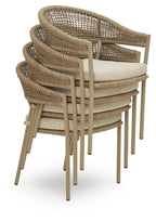 Beige woven arm chairs with cushions and armrests, set of 4 shown from side angle.