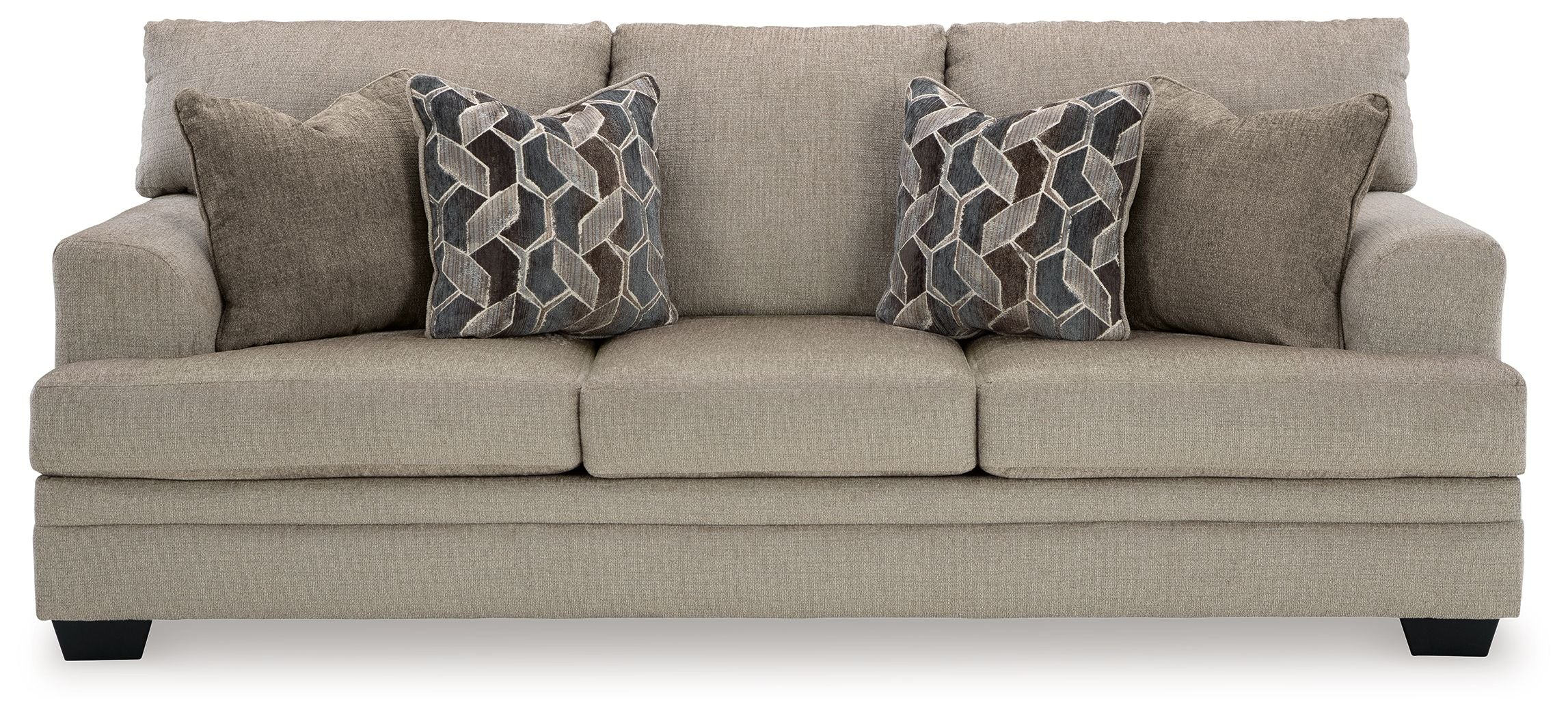 Stonemeade sofa in light taupe fabric with two geometric patterned throw pillows