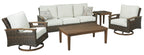 Settee-style sofa with beige cushions and patterned throw pillows, shown with matching chairs