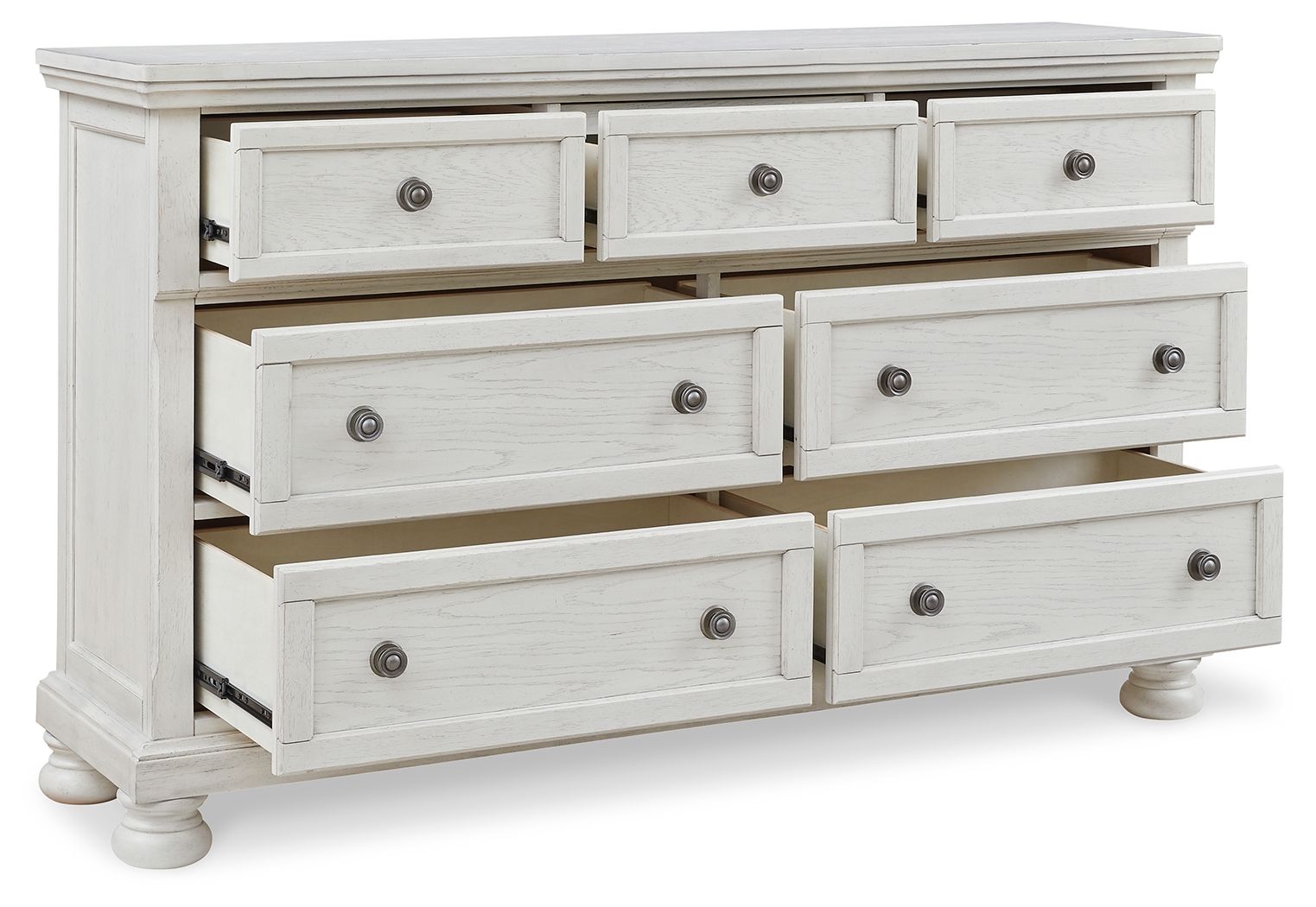 White dresser with multiple drawers and round knob hardware
