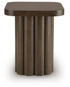 Dark brown wooden side table with circular top and fluted pedestal base