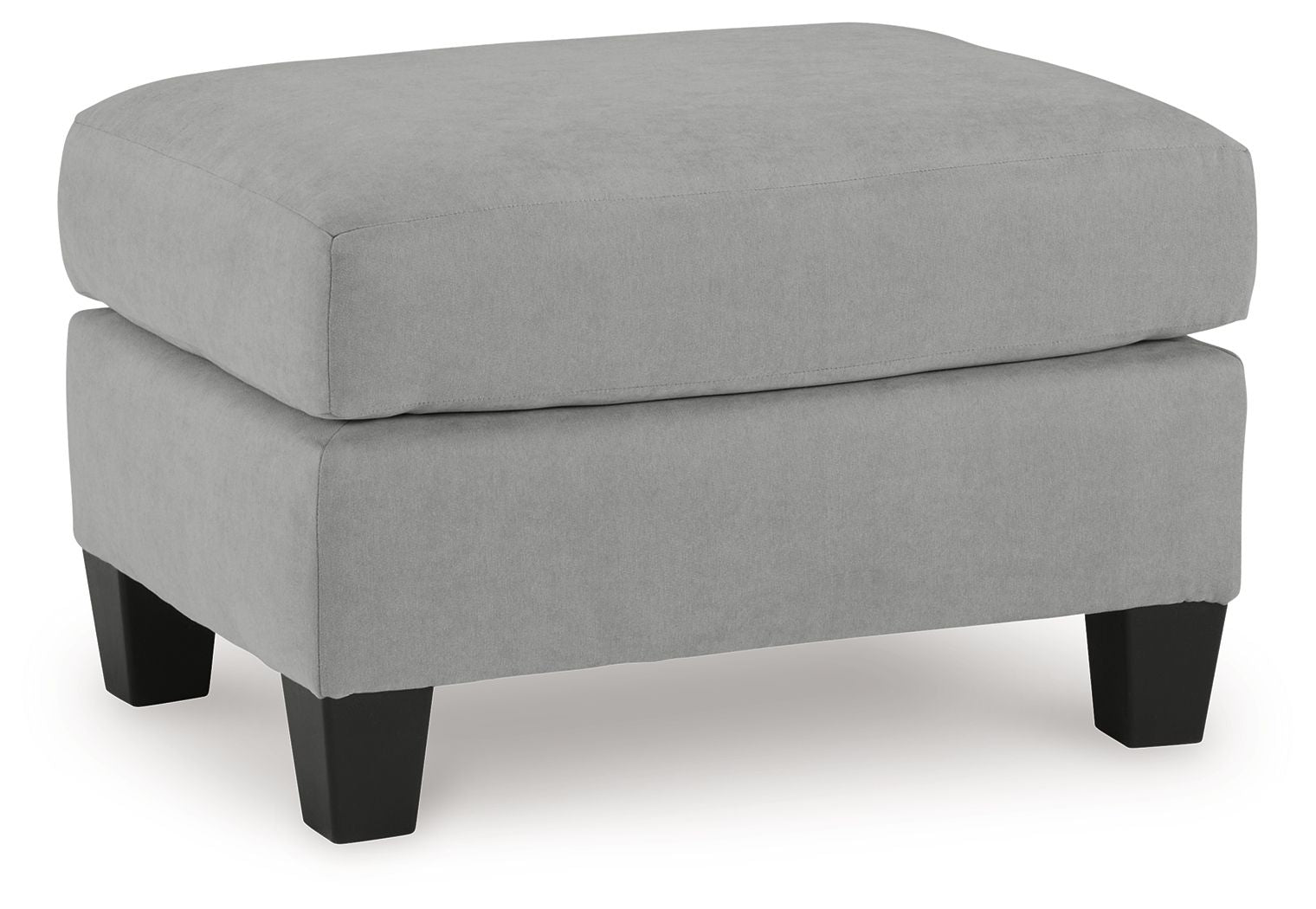 Gray upholstered ottoman with rounded top and dark tapered legs