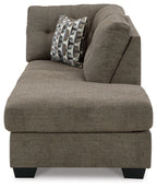 Chocolate-brown corner chaise seat with rounded arm and tufted back, plus patterned cushion
