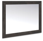 Dark gray bedroom mirror with rectangular frame and glass reflection