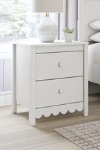 White two-drawer night stand with scalloped apron and round knobs
