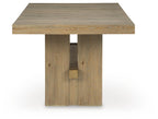Light brown dining table with square pedestal base and ribbed-looking tabletop grain